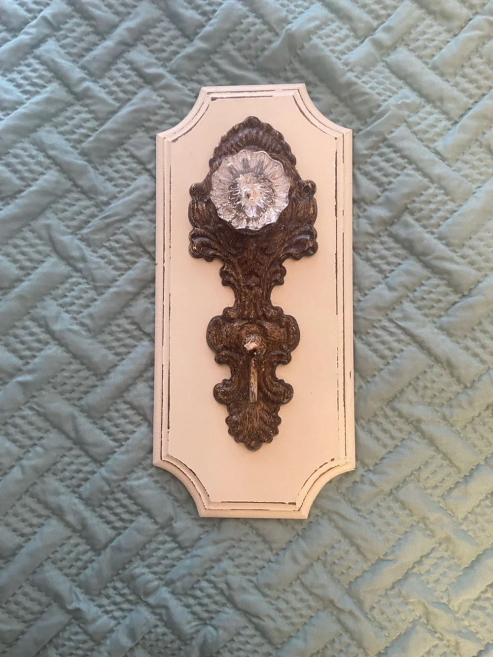 Decorative Cream Wall Hook with Vintage Bronze Colored Accent and Acrylic Knob